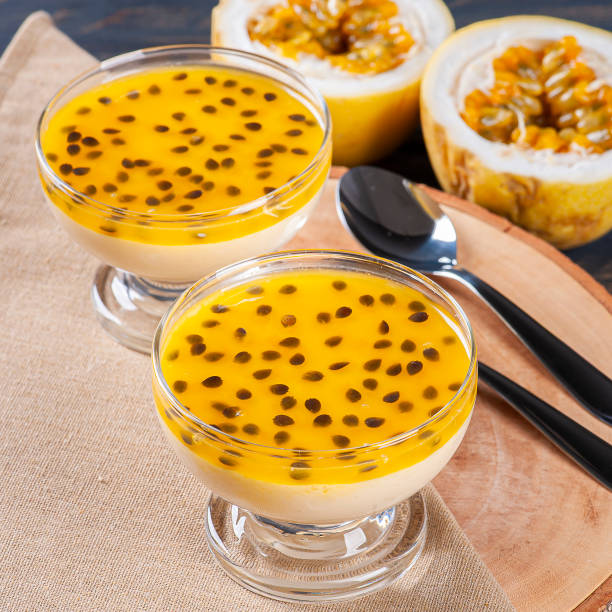 istock Passion fruit mousse. Refreshing dessert with fresh passion fruit topping 1299449588