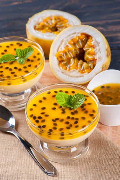 istock Passion fruit mousse. Refreshing dessert with fresh passion fruit topping 1299449638