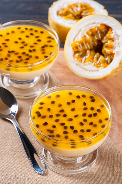 istock Passion fruit mousse. Refreshing dessert with fresh passion fruit topping 1299449656