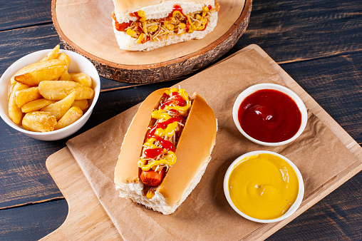 The Foot Long Ballpark Hot Dog with, Ketchup, Mustard, Relish and Onions