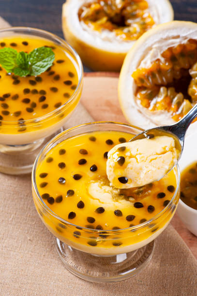 istock Passion fruit mousse. Refreshing dessert with fresh passion fruit topping 1299449734