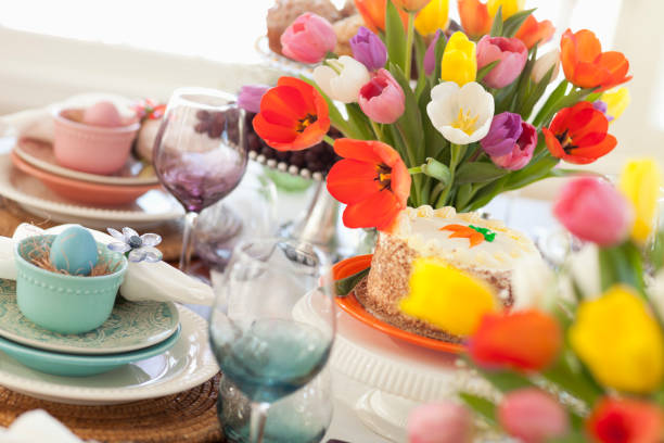 Easter Dining Table Easter Dining Table Focus on Blue Eggcup carrot cake day stock pictures, royalty-free photos & images
