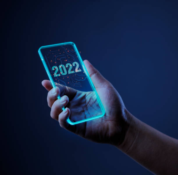 technology 2022 with mobile phone. Isolated on dark background.