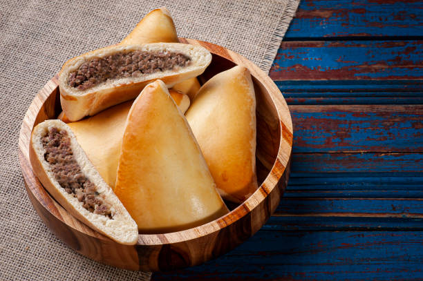 istock Meat sfiha. Typical Arabic dish that has been adapted for Brazilian cuisine 1299451799