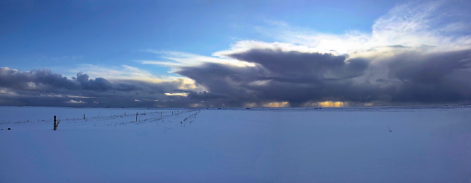 Impressive storm in Icelandic highlands with dramatic clouds and sky at sunset, Iceland