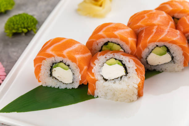 istock Japanese cuisine. Sushi roll with salmon 1299454698