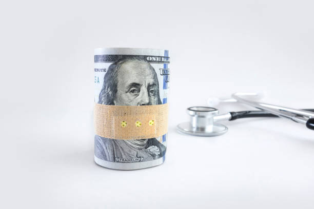 spese mediche - currency stethoscope medicare usa foto e immagini stock