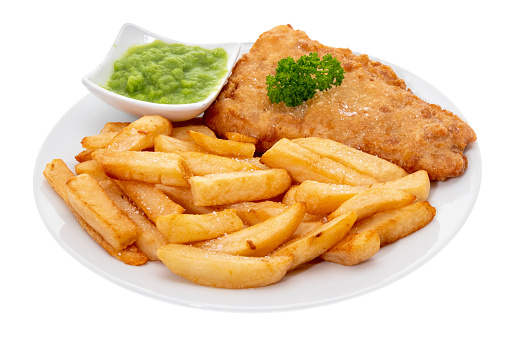 Fish and chips with mushy peas - white background