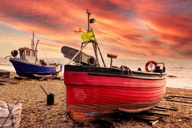istock Fishing boat at sunrise, Hythe, Kent, UK 1299457380
