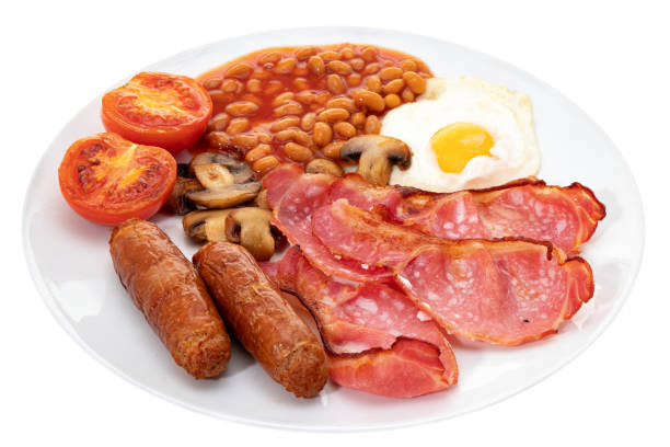 Fried full English breakfast Fried full English breakfast - white background english breakfast stock pictures, royalty-free photos & images