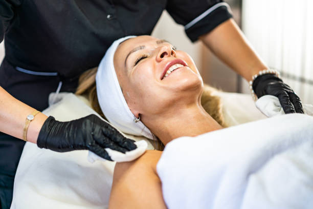 Satisfied client lying on bed in beauty salon