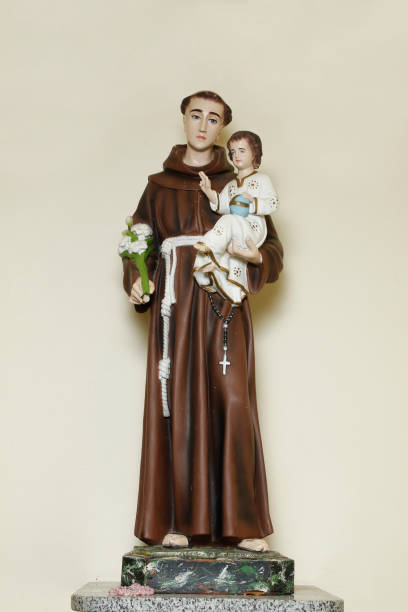 istock saint Anthony of lisbon and baby Jesus catholic image 1299458159