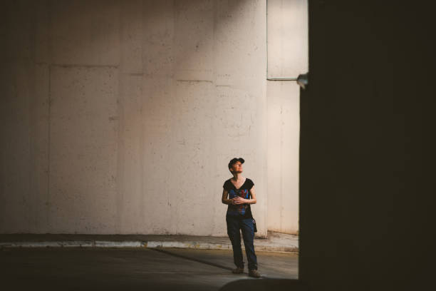 istock Architectural portrait of young woman 1299459468