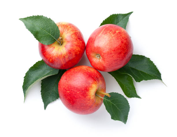 istock Red Apples With Leaves Isolated Over White 1299459823