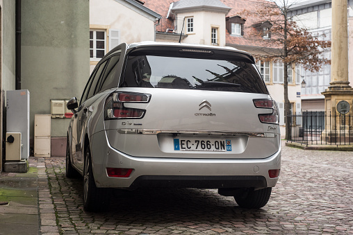 Mulhouse - France - 30 January 2021 - Rear view of grey Citroen C4 Picasso parked in the street