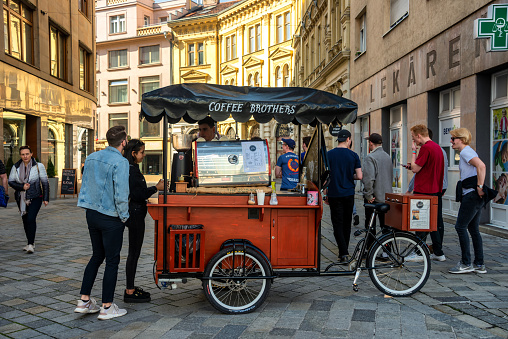 Bratislava, Slovakia -17.03.2019: Coffee Brothers retro style mobile bicycle coffee cart in Bratislava, Slovakia