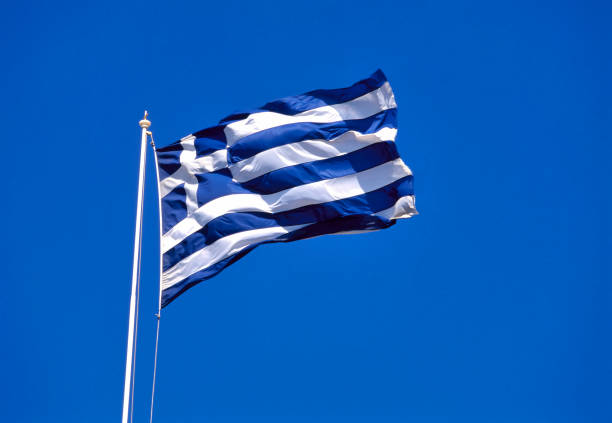 揮舞希臘國旗 - 希臘國旗 個照片及圖片檔