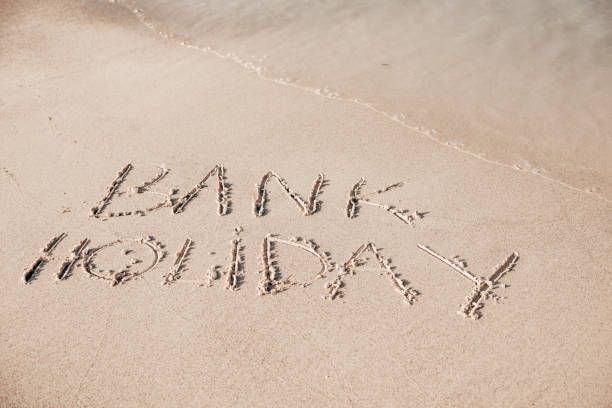 istock bank holiday text on the sand 1299462169