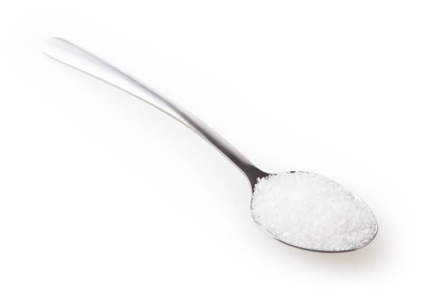 istock Teaspoon of sugar isolated on white background with clipping path 1299464067