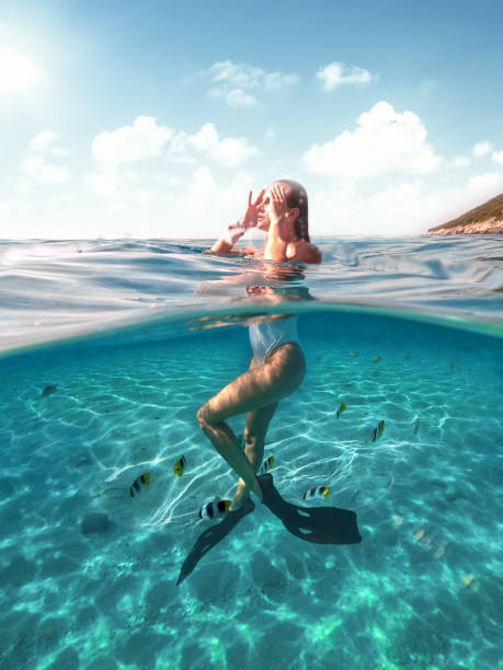 Swimming with fish in the sea