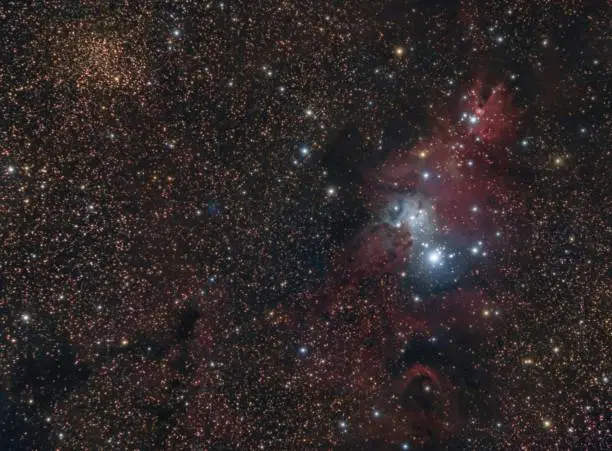 It is a H2 region in Monoceros constellation surrounding the famous Christmas tree cluster.

EXIF:
Imaging telescopes or lenses: SkyWatcher ED80 Pro
Imaging cameras: QHYCCD QHY9C 
Mounts: Skywatcher HEQ5 Pro Synscan
Guiding telescopes or lenses: Orion 50mm guidescope/finderscope
Guiding cameras: QHYCCD QHY5 Mono 
Focal reducers: Skywatcher .85x Focal Reducer & Corrector
Frames: 13x1200"
Location: Petrova gora (Croatia)
