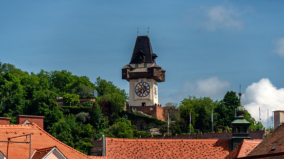 The fortified medieval tower got its present shape around 1560. And its characteristic wooden gallery as a fire station. Three bells are ringing from the Clock Tower. Three coats of arms decorate the walls. A tower on this spot of the hill was first mentioned in the 13th century. When the fortress was reconstructed in the middle of the 16th century, the tower was given its present shape.