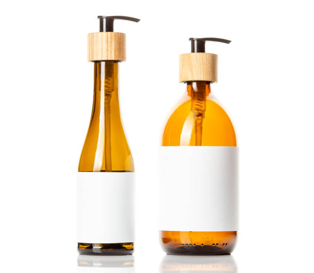 istock Brown glass pump dispenser bottle for cosmetics 1299465424