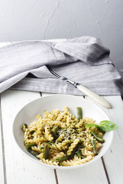 istock Fusilli pesto pasta with green beans. 1299467183