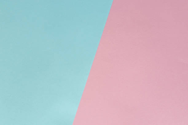 istock Pink and blue colored tinted paper seets 1299469136