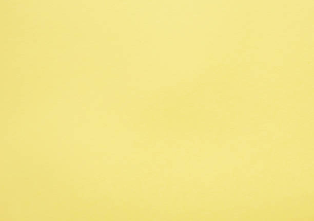 istock Yellow colored tinted paper sheet 1299469157