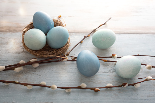 Blue easter eggs on vintage planks