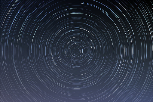 Star trails in a night sky, long exposure style realistic circular star arcs pattern, star motion due to Earth's rotation vector illustration