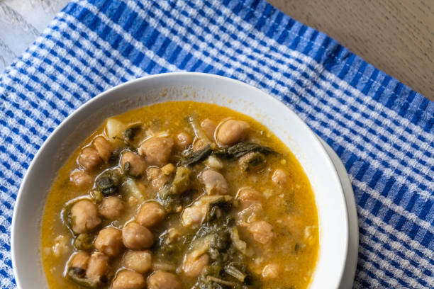 istock Chickpea stew with chard served in a white bowl 1299473848