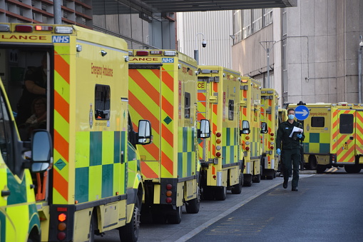 London, United Kingdom - January 28 2021: Ambulance vehicles at the Royal London Hospital during the coronavirus pandemic.