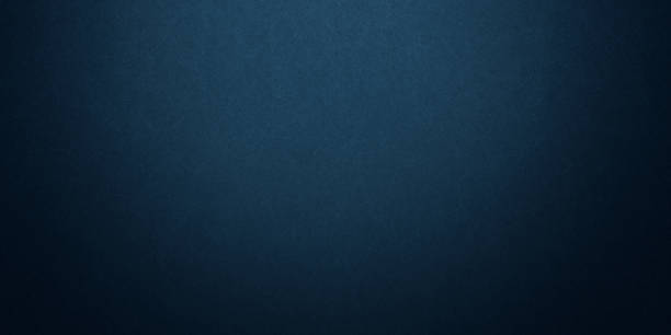 istock Texture of old navy grunge blue paper closeup background 1299474840