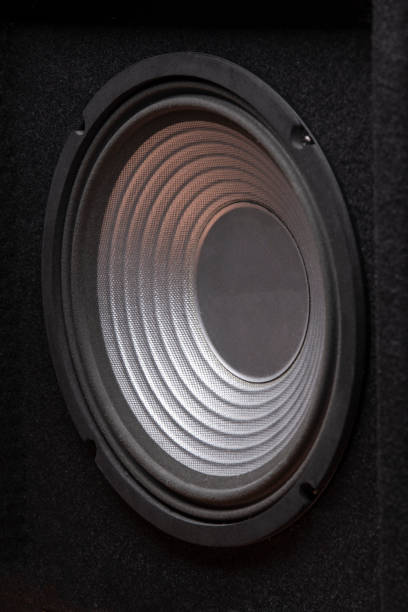 istock Black subwoofer speaker car audio music system 1299476002