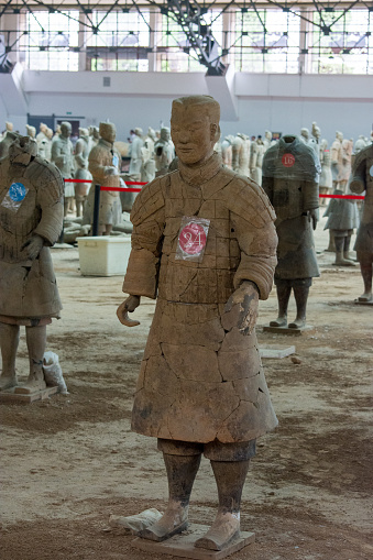 Xian / China - August 4, 2015: Terracotta Army, excavated terracotta sculptures depicting the armies of the first Emperor of unified China Qin Shi Huang at his burial place in Xian, China