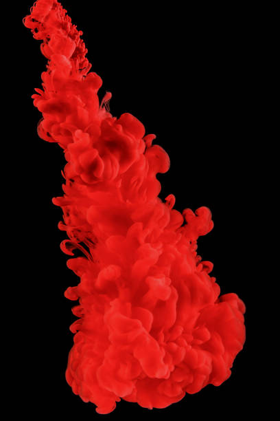istock Red abstract background. Ink splashes in water on black. 1299483160