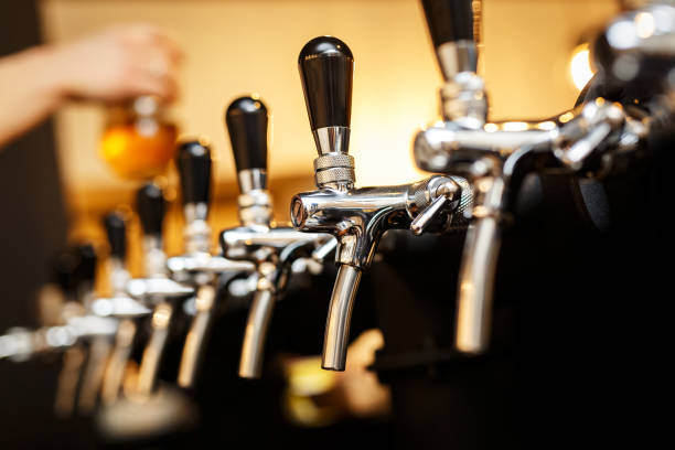 istock Row of taps in a beer tap. 1299483269