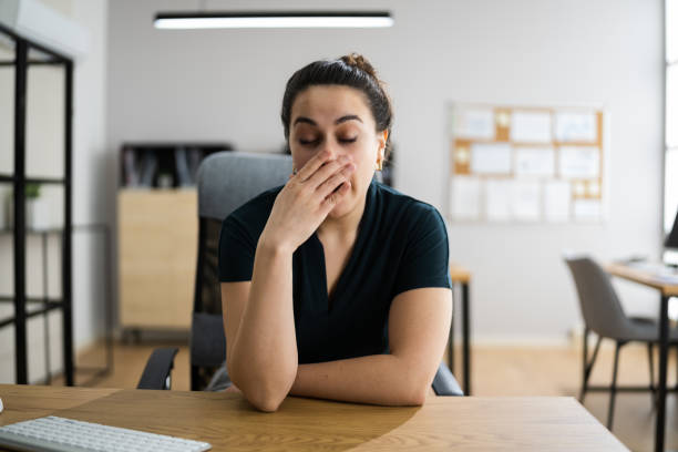 istock Tired Bored Woman In Office 1299485555
