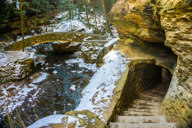 istock Winter Woodland Cave Hike 1299491435