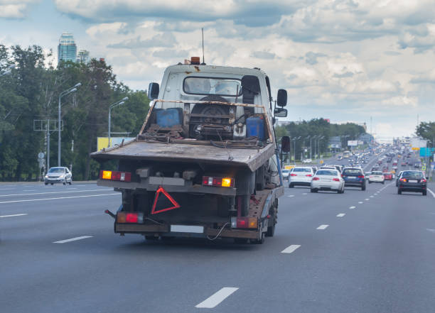 istock Tow Truck Carries a broken tow truck 1299493443
