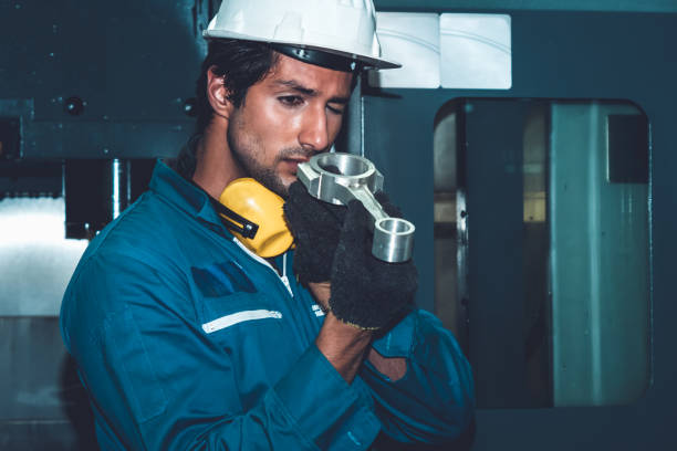 istock Smart factory worker or engineer do machine job in manufacturing workshop 1299498321