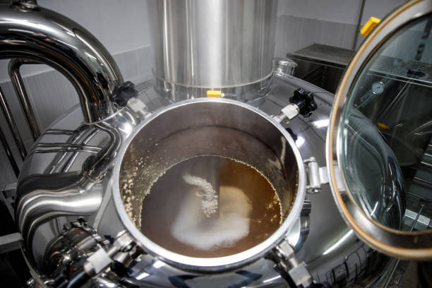 istock Brewing of beer, equipment at microbrewery, top view 1299504458