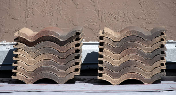 Two Stacks of Curved Brown Tiles for Roof stock photo