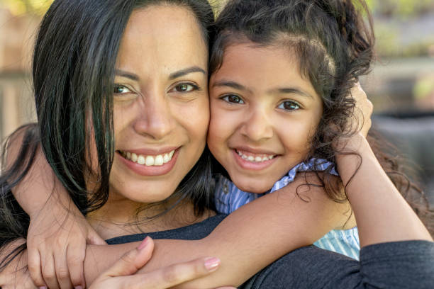 istock Beautiful mother and daughter 1299516311