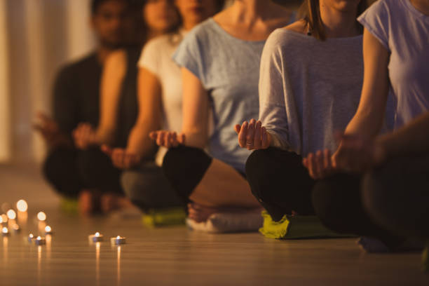 istock Group of adults in yoga class 1299516426