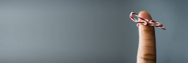 istock African American Woman With Memory Ribbon. Don't forget 1299523647