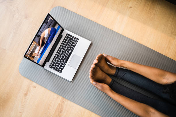 istock Online Laptop Home Fitness Workout 1299523713