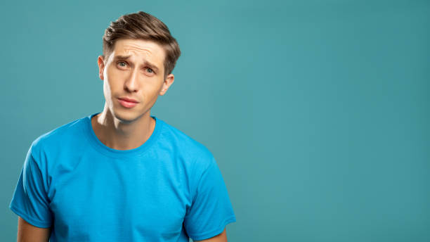 istock confused male portrait puzzled face 1299524451